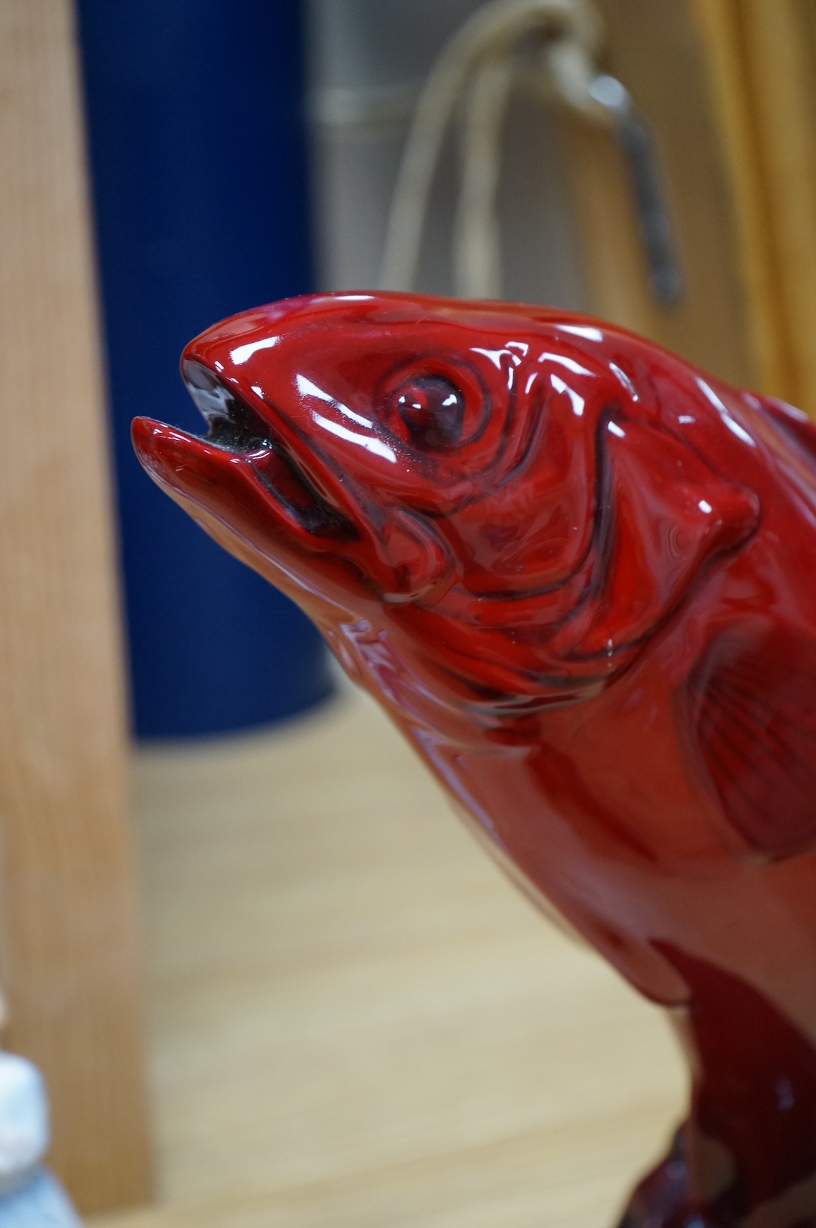A Royal Doulton leaping salmon in flambe glaze, 31cm
